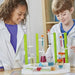 kids in lab coats using chemistry station chemistry set