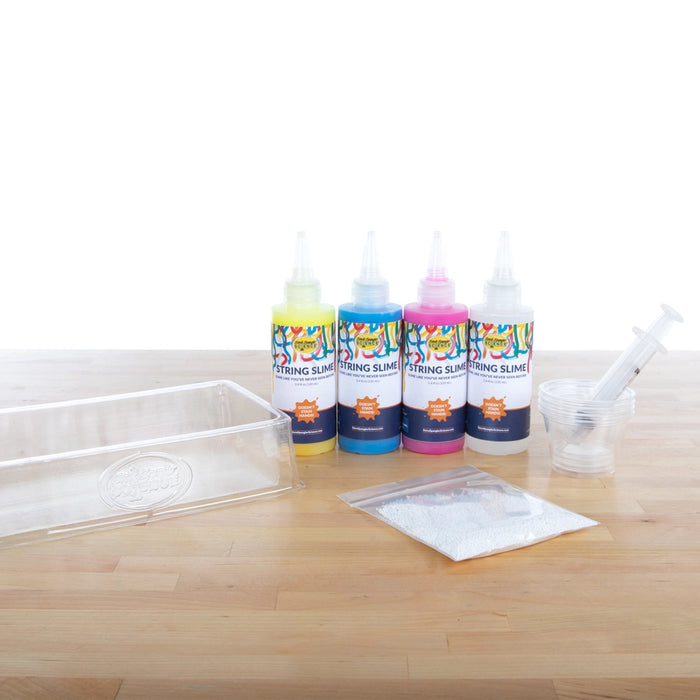 string slime deluxe set contents: tray, powder, slime in yellow, red and blue, squeezy bottles, syringe and mixing cups