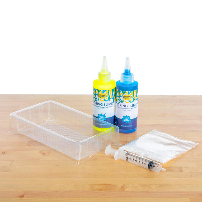 string slime starter set contents: blue and yellow slime, squeezy bottles, powder, syringe and tray