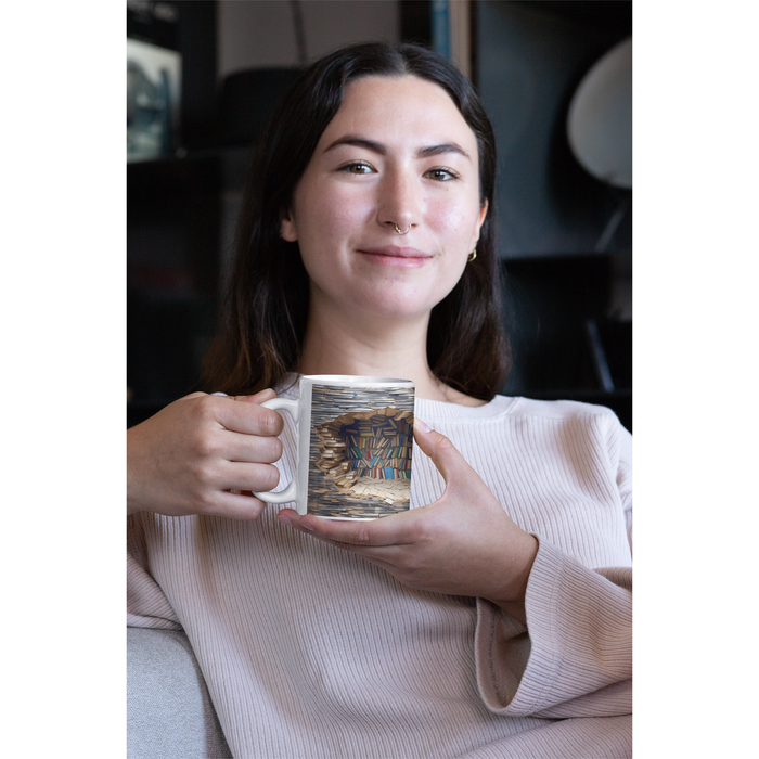 White ceramic mug with 3D bookshelf design